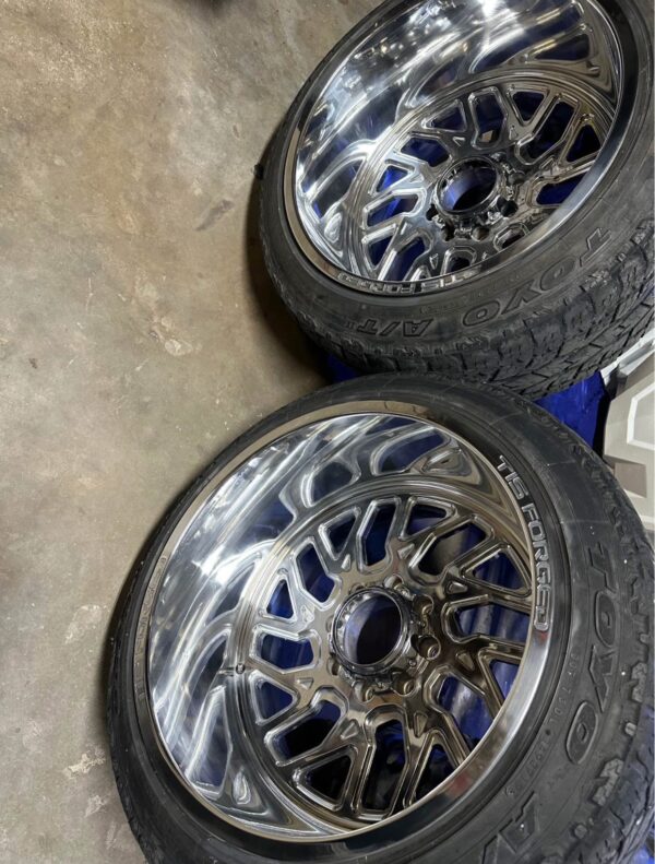 img_4033 TIS Forged 22x14 Polished Wheels and 33” Tires 8 lug
